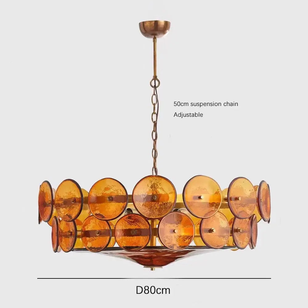 Luxurious Glass Disc Chandelier – 50s Chic with amber glass discs and adjustable chain, perfect for dining or living spaces.