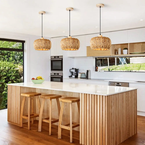 Handwoven Bamboo Pendant Shade illuminating a modern kitchen with natural wooden accents and a rustic charm.
