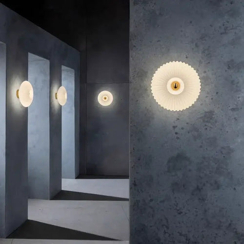 Radiant Modern Glass Wall Lamp illuminating a contemporary hallway with elegant design.