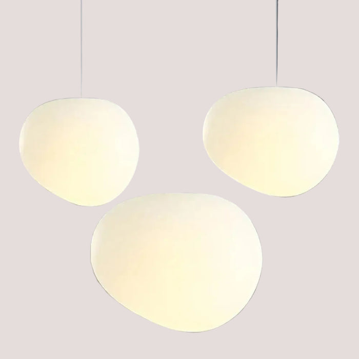 Simple Nordic Restaurant Pebble Chandelier featuring three minimalist pebble-shaped pendants in a sleek design.