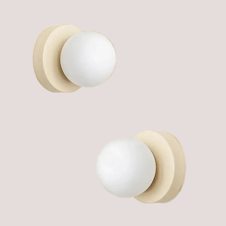 Colourful Macaron Wall Lamp in minimalist design with soft white globes and light beige bases.