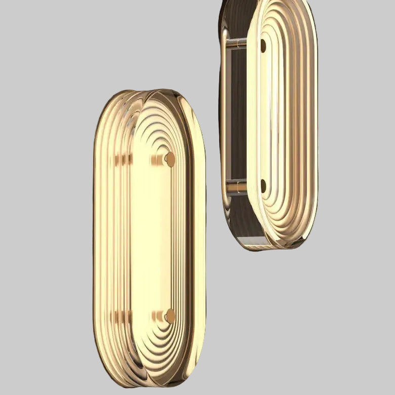 hero Two wall-mounted lights with a warm glow on a dark background