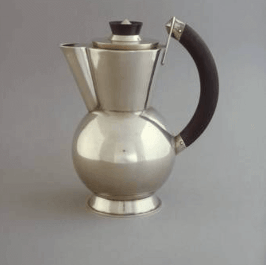 Bauhaus 1922 wine jug by Christian Dell, featuring modernist design and functionality, housed in the Art Institute of Chicago.