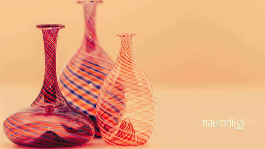 A 2023 Gift Guide: buying a vase as a gift featuring artistic red glass vases, perfect for any occasion by Nauradika.com