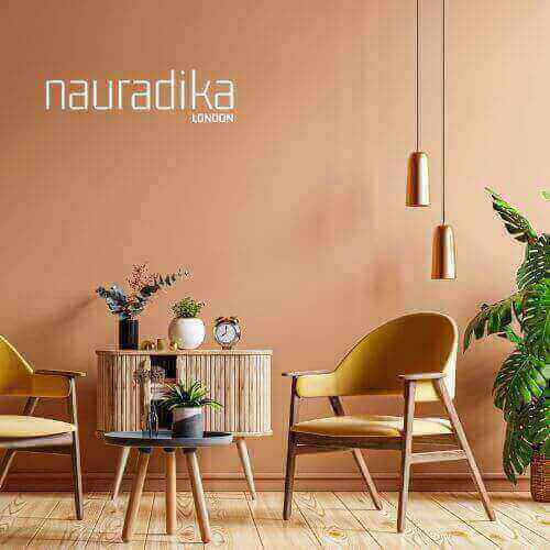 Modern living room showcasing use of brown in interior design with wooden furniture and green plants.