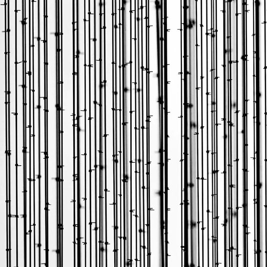 How can I effectively mix and match different patterns in my home decor