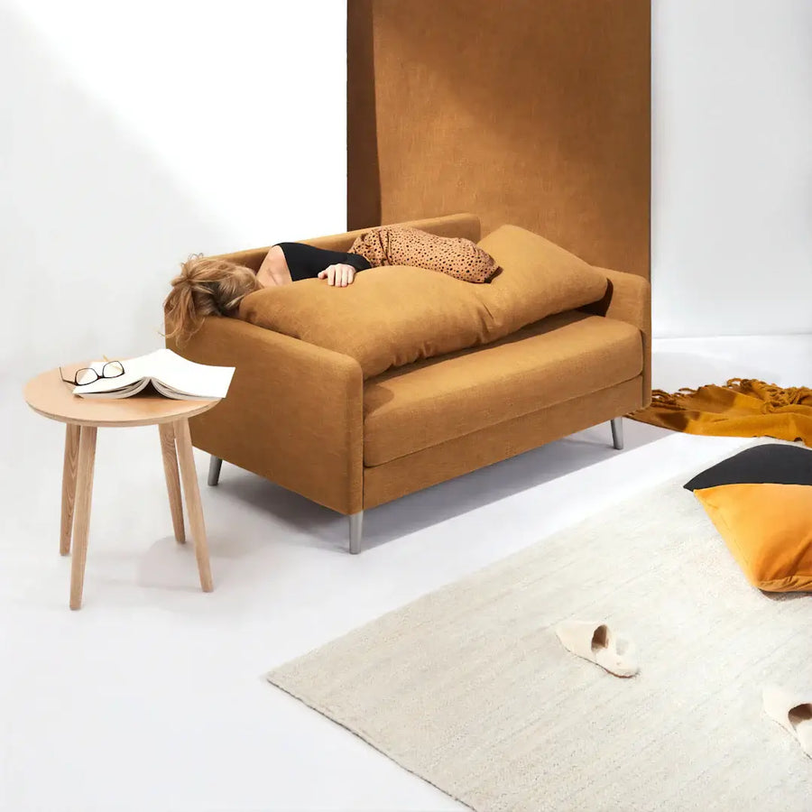 What impact does furniture scale have on room design
