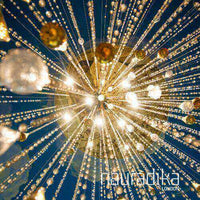 Chandelier exemplifying Use of Warm Light in modern Interior Design with sparkling crystals.