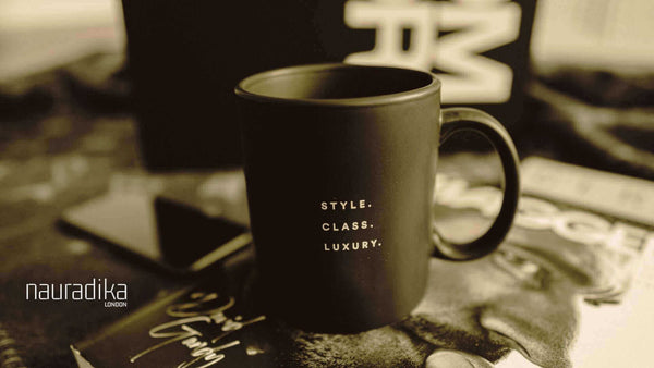 Black mug with "Style. Class. Luxury." text, highlighting the concept of "Have mugs evolved over time?" by Nauradika.