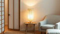 Japanese Rice Paper Lamps: Embracing Wabi-Sabi in Your Autumn Home with cozy warm lighting in a minimalist style living room.