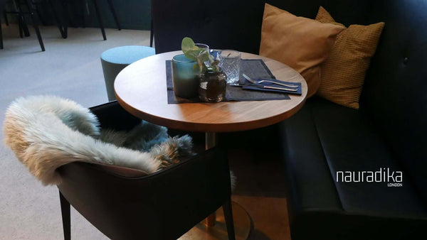 Cozy Scandinavian-style interior seating area reflecting designs by key Scandinavian interior designers of the 20th century.