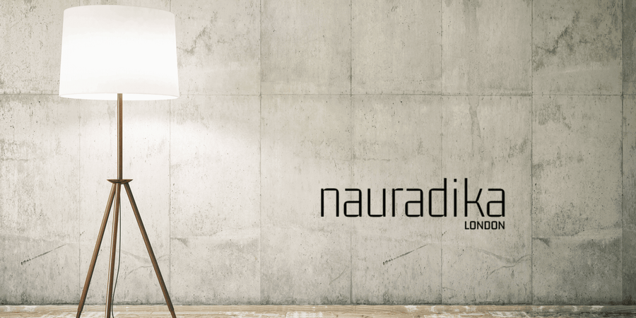 Modern statement lighting fixture in a minimalist interior by Nauradika