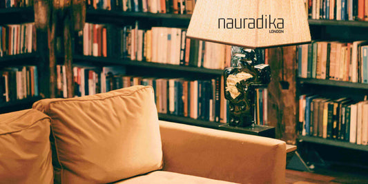 Cozy room with sofa and lamp by Nauradika, perfect for how do you make a room feel cozy.
