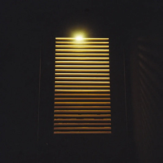 How does lighting affect the overall mood of a room