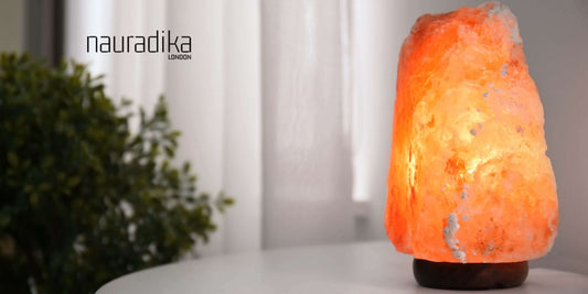 Himalayan salt lamp on table for Lighting for Relaxation and Ambiance in home.