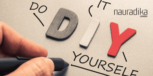 Close-up of DIY concept with letters and hand writing 'do it yourself' for DIY lighting ideas.