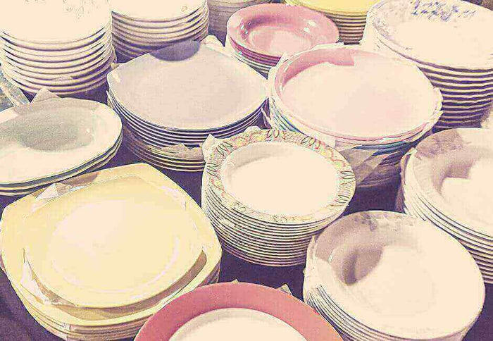 Colorful stack of plates from the Reasons why the Russel Wright Melamine tableware range was so popular collection.