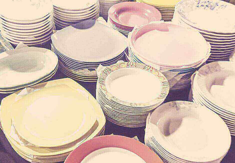 Colorful stack of plates from the Reasons why the Russel Wright Melamine tableware range was so popular collection.