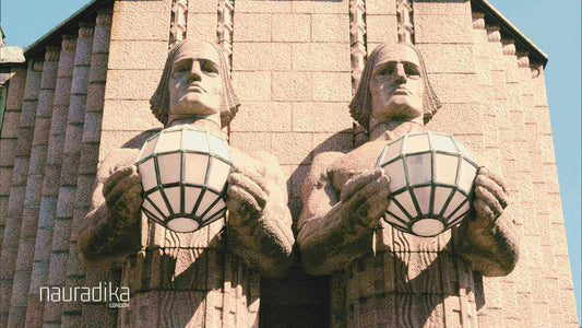 Rautatientori and design in Finland: Stone figures at Helsinki Central railway station.