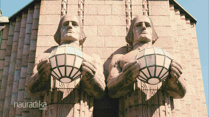 Sculpture detail of Rautatientori railway station in Helsinki, showcasing Finnish design and architecture.