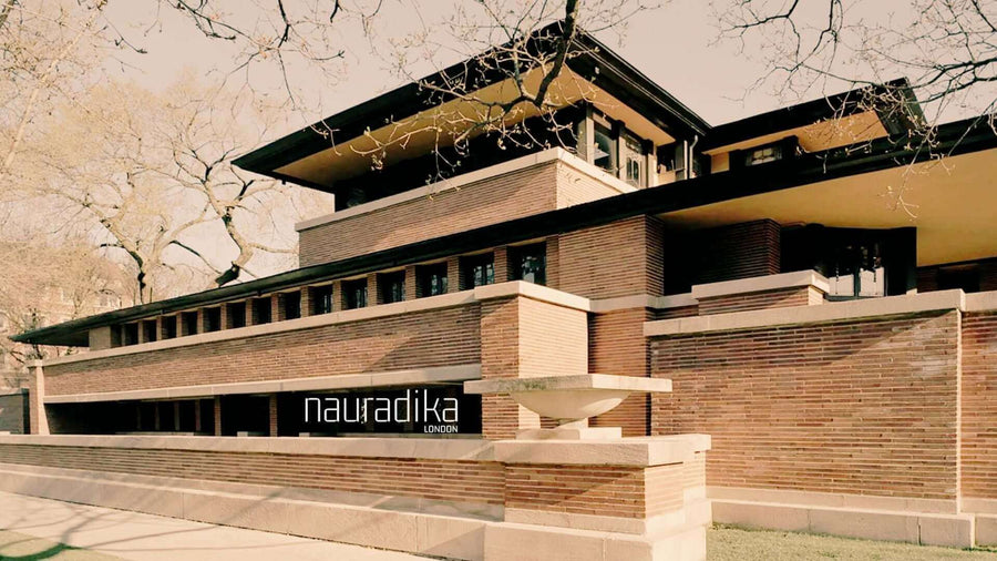 How has Frank Lloyd Wright influenced interior design (updated in 2023)? Iconic architectural design exemplifying his principles.