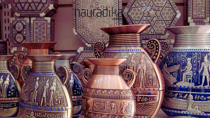 Symbolism in Ancient Egyptian Vase Decorations: A Window into Religious Beliefs, featuring hieroglyphs and deity images