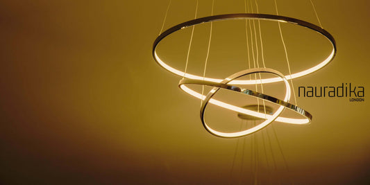 Modern chandelier with circular design, an example of sculptural lighting options.