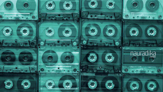 A collection of vintage cassette tapes from the 80s, representing Eighties Decor in a guide to interior designs of the 80s in Europe.