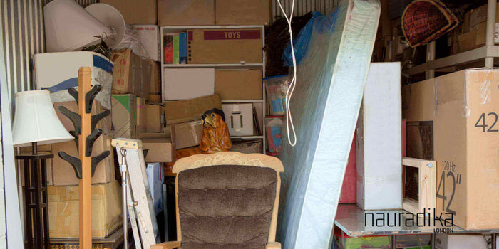 Cluttered storage space illustrating how adequate storage is a fundamental aspect of interior design, featuring boxes and furniture.