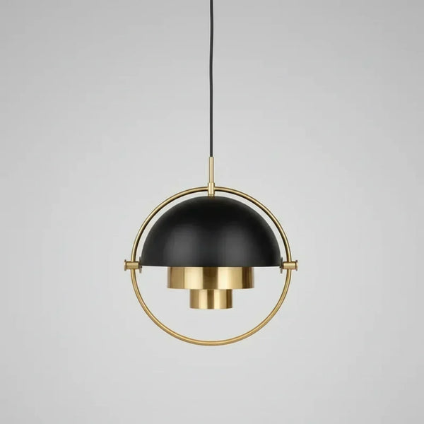 Modern pendant light in brass and black, showcasing Trends in Lighting: Brass vs Black vs Chrome — What Designers Are Choosing in 2026/2027.