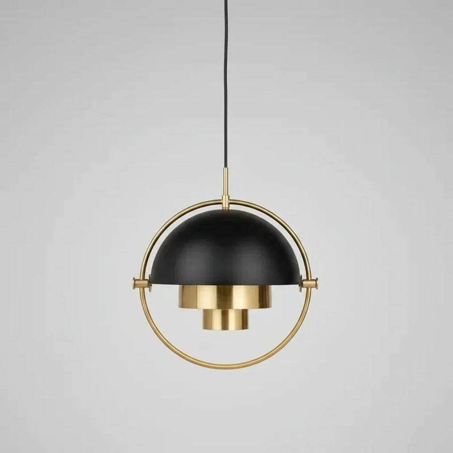 Modern pendant light in brass and black, showcasing Trends in Lighting: Brass vs Black vs Chrome — What Designers Are Choosing in 2026/2027.