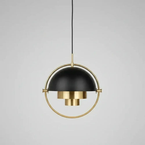 Modern pendant light in brass and black, showcasing Trends in Lighting: Brass vs Black vs Chrome — What Designers Are Choosing in 2026/2027.