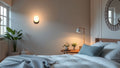 Bedroom interior featuring a rechargeable wall light, highlighting specification-led design freedom for architects.