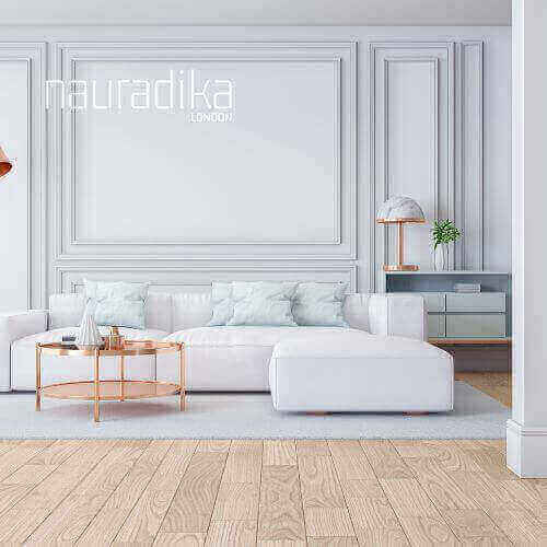 Elegant living room with white decor showcasing Use of White In Interior Design principles, featuring modern furniture and accents.