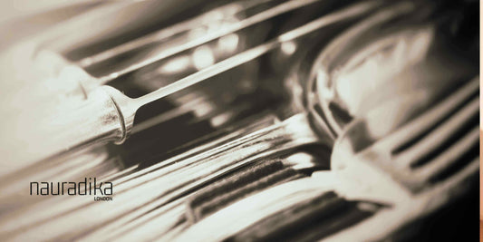 Elegant silverware set demonstrating how to impress your guest with silverware at formal dining events.