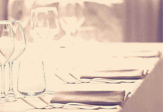 Elegant dining setup highlighting benefits and drawback of cotton tableclothes in 2023