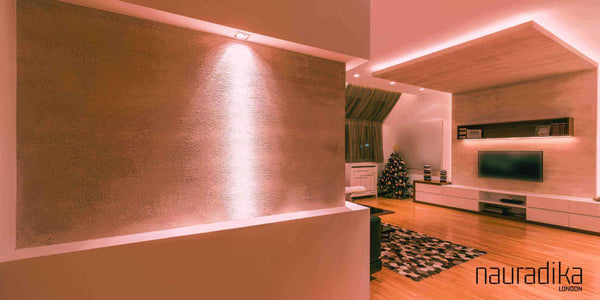 Modern living room showcasing layered lighting ideas with ambient, task, and accent lights for a cozy and dynamic atmosphere.