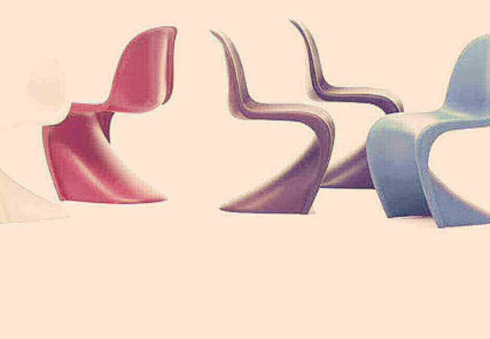 Most iconic designs by Danish designer Verner Panton: colorful Panton chairs in a row.