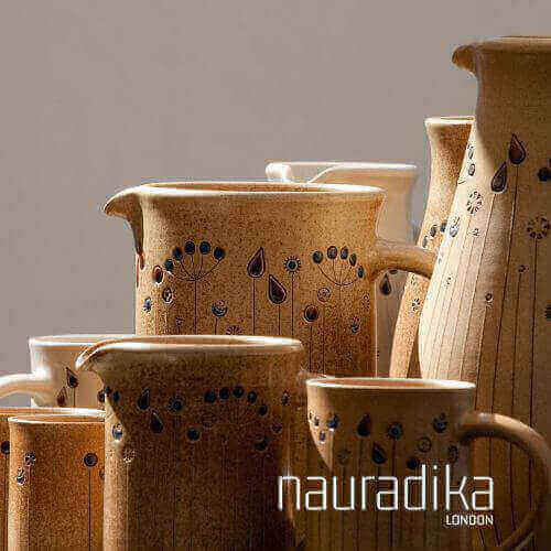 Ceramic pitchers and jugs used in interior design showcasing craftsmanship, aligned with the use of ceramic objects in interior design theme.