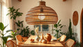 Dining room with Rattan Pendant Lights: The Natural Lighting Trend Taking Over in 2026, featuring modern rattan decor and greenery.
