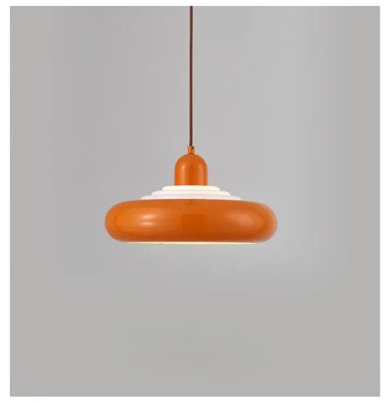 hero Orange pendant light with white interior on a gray background