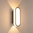 Aluminum Outdoor Modern Nordic Dimmable Wall Lamp illuminating a wall with a sleek design.