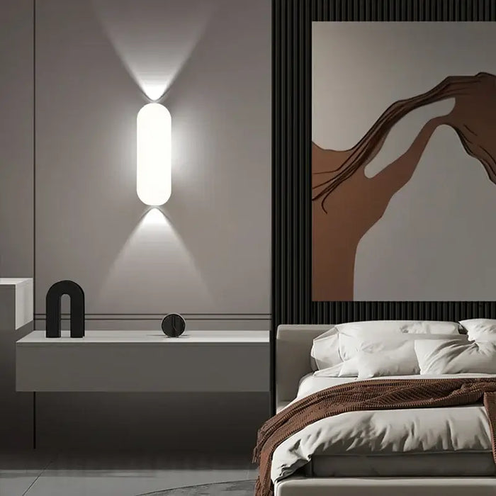 Aluminum Outdoor Modern Nordic Dimmable Wall Lamp illuminating a stylish bedroom with minimalist decor.