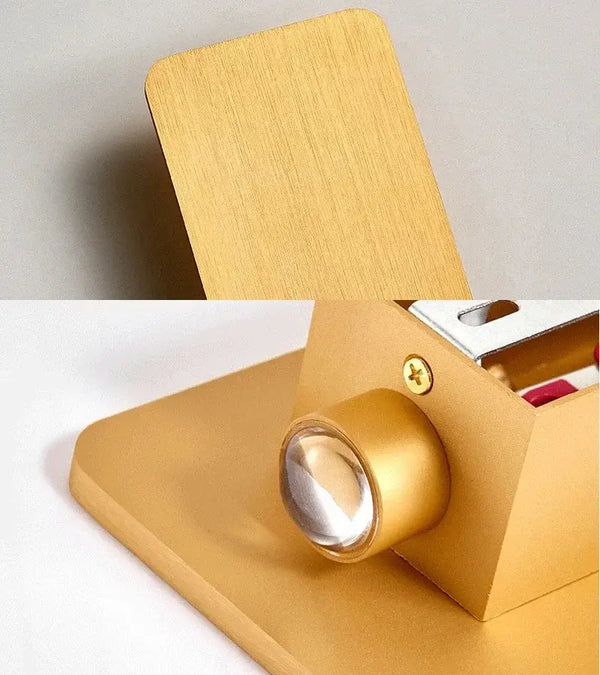 Brushed Gold/Black Double Head Wall Light showing brushed gold finish and light fixture detail.
