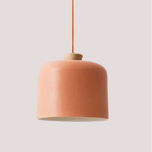 Colourful, modern, metal Danish Light Pendant in peach color with wooden accent, perfect for stylish interiors.