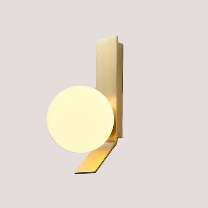 Contemporary Golden Wall Lamp with Glass Ball featuring a modern design and unique wrought iron base.