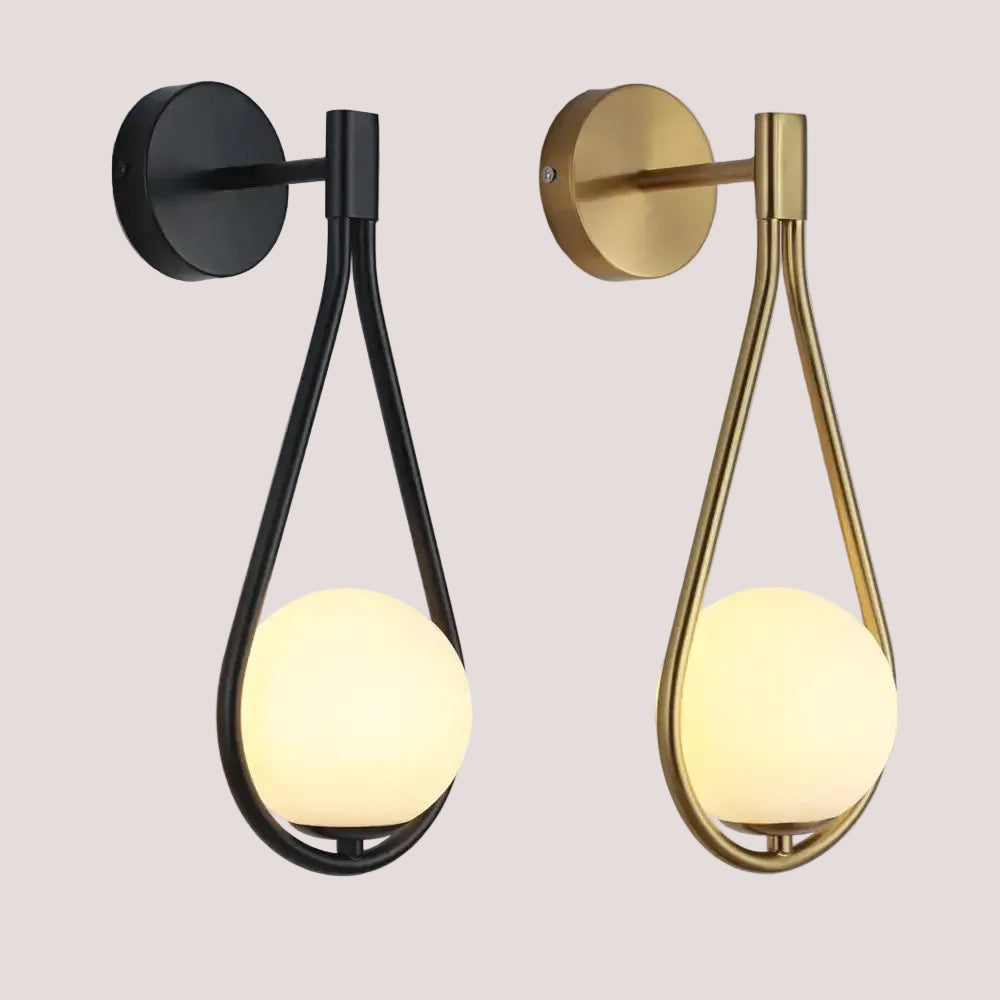 Drop Luxury Glass Ball Wall lamp in black and gold finishes showcasing elegant modern design.