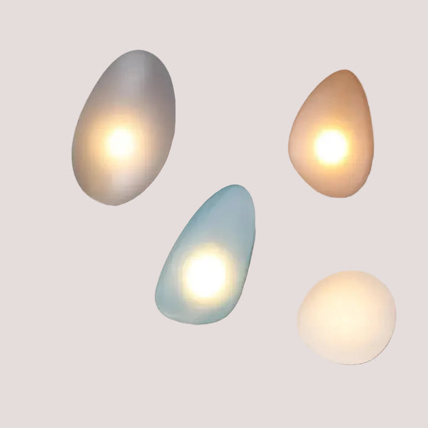 Elegant Frosted Glass Pebble Wall Lamp - Minimalist Nordic Style with soft glowing colors