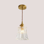 Elegant Glass Pendant Light with Brass Accents - Illuminate with Style, showcasing a stylish, glass-led chandelier.