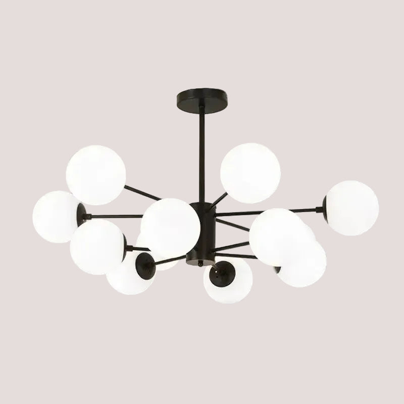 Mid-century modern pendant light with frosted glass globes on black arms